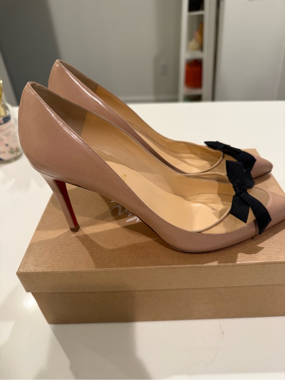 Christian Louboutin Blush Nude Pointed-Toe Pumps with Black Bows - Picture 3 of 7